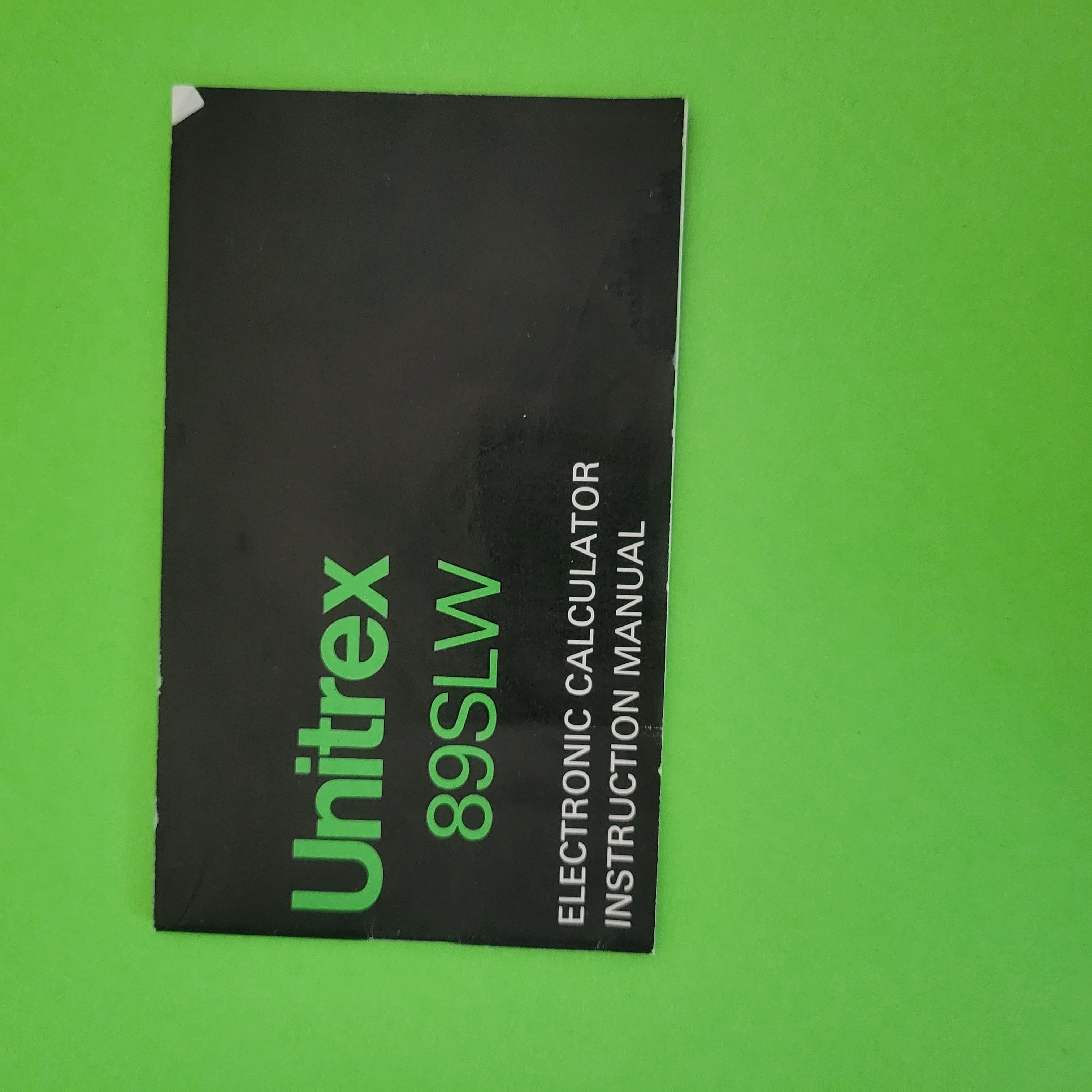 An image of the manuel of a Unitrex 89 SLW Four function plus calculator